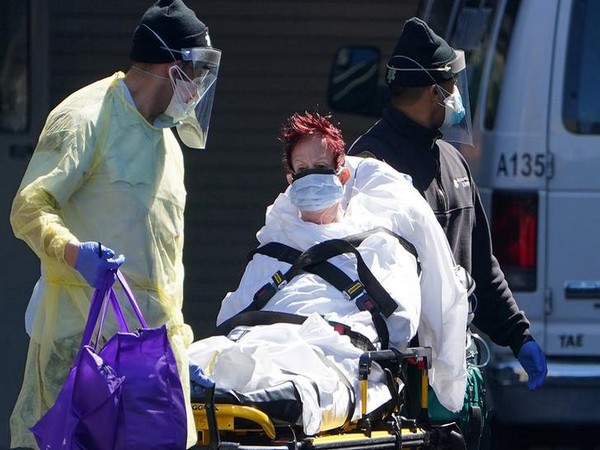    A patient is wheeled to an ambulance during the outbreak of Coronavirus disease (COVID-19), in the Manhattan borough of New York City, New York, U.S., March 26.