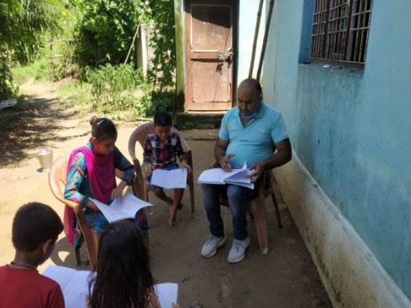 Underpriviledged children being taught by teachers in Udhampur, Jammu. Photo/ANI