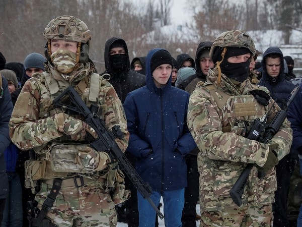 People take part in a military exercise for civilians conducted by veterans of the Ukrainian National Guard Azov battalion in Kyiv. (Photo Credit - Reuters)