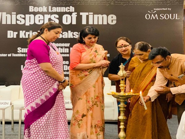 Union Textiles Minister Smriti Irani launches 'Whispers of Time' authored by Dr Krishna Saksena on Sunday. Photo/ANI