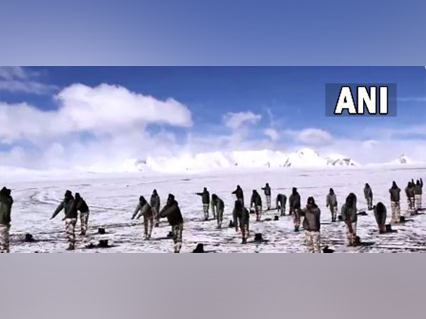 ITBP personnel performing yoga at a higher altitude on 8th International Yoga Day on Tuesday. [Photo/ANI]