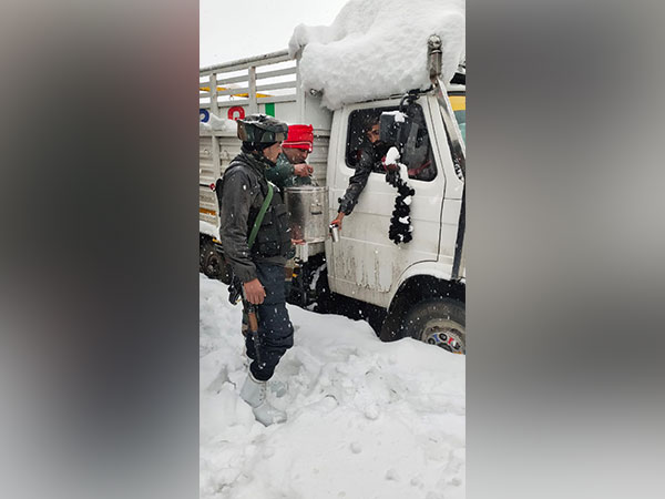 Indian Army personnel helping people