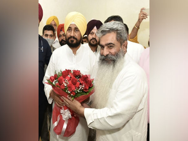 Punjab Cabinet Minister Bharat Bhushan Ashu with Chief Minister Charanjit Singh Channi (Photo/ANI)