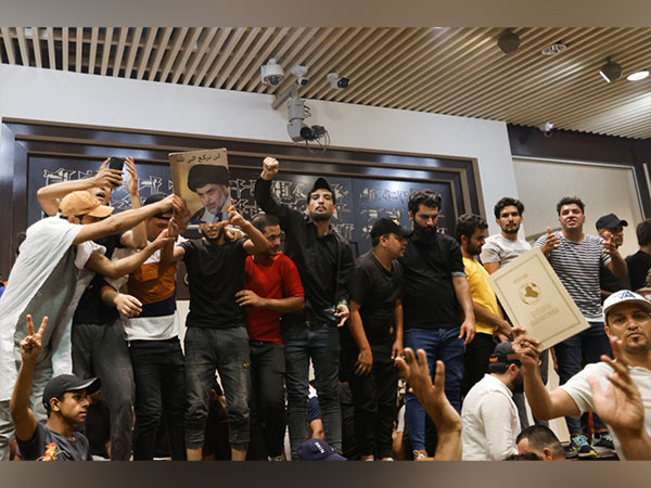 Supporters of Iraqi Shi'ite cleric Moqtada al-Sadr protest against corruption inside the parliament building in Baghdad (Image Credit: Reuters)