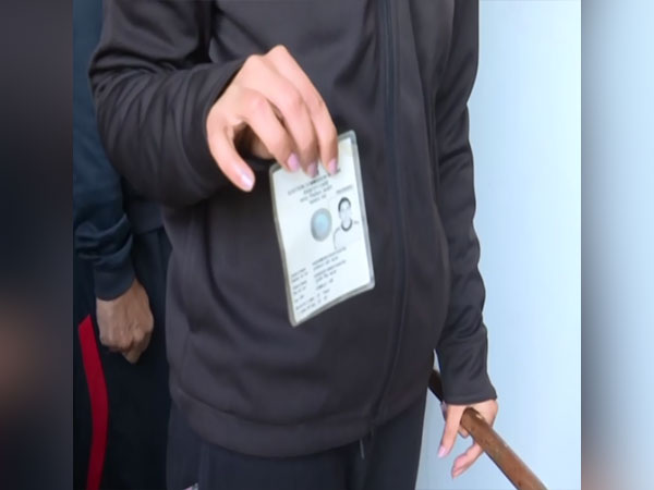 A voter after casting her vote outside booth no.123 on Chandigarh Sector 8. (ANI)