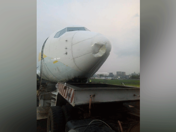 The disabled SpiceJet SG 6237 aircraft being retrieved by Air India officials on Thursday (Photo/ANI)