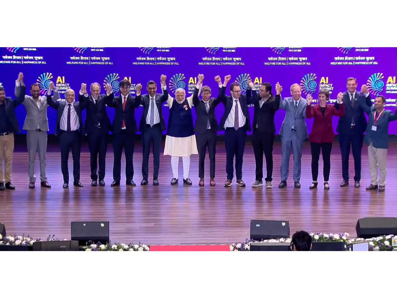Prime Minister Narendra Modi joins world leaders, heads of state, and global tech CEOs for a family photo at Bharat Mandapam during the India AI Impact Summit 2026 in New Delhi. (Photo: DD News)