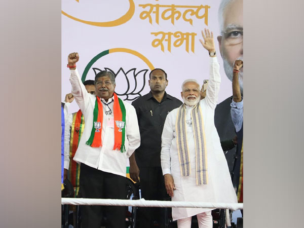 Maharashtra BJP chief Chandrakant Patil with Prime Minister Narendra Modi at a rally in Pune on Thursday. Photo/Twitter@ChDadaPatil