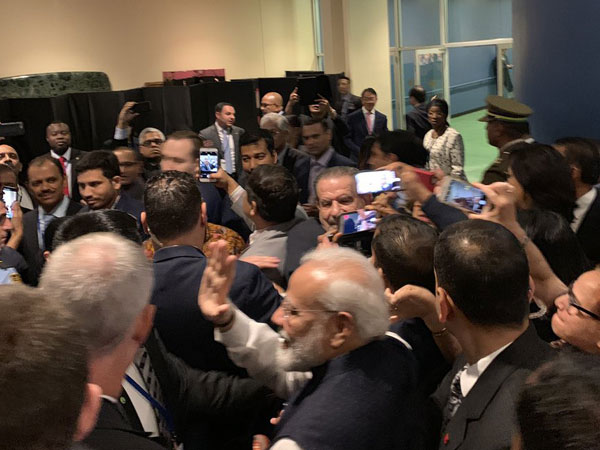 People taking selfies with PM Modi after his speech at UNGA on Friday. (Photo/ANI)
