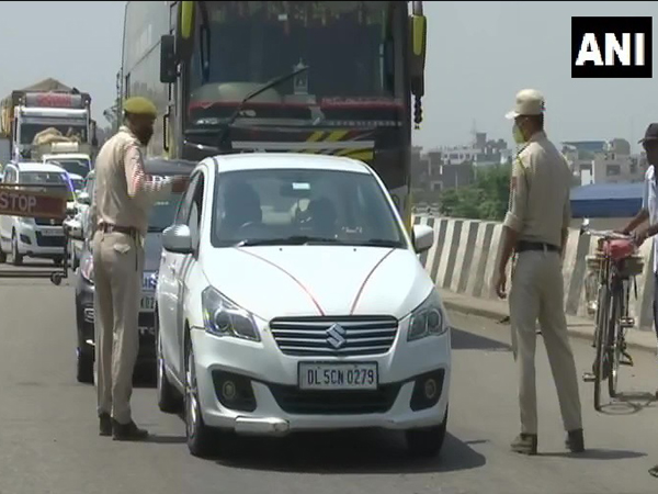 Police personnel checking vehicles in Kaluchak area of Jammu. (Photo/ANI)