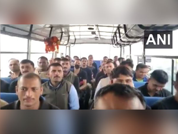 Evacuated Indians after landing in Gujarat 