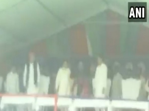 SP president Akhilesh Yadav, BSP president Mayawati and SP leader Dimple Yadav at a rally in Kannauj on Thursday. Photo/ANI