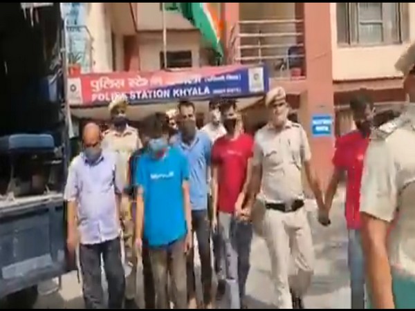 The Delhi Police with the arrested persons. (Photo: Twitter @DCPWestDelhi)