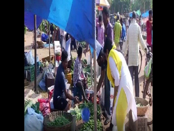 People buying vegetables in Bhubaneswar. Photo/ANI