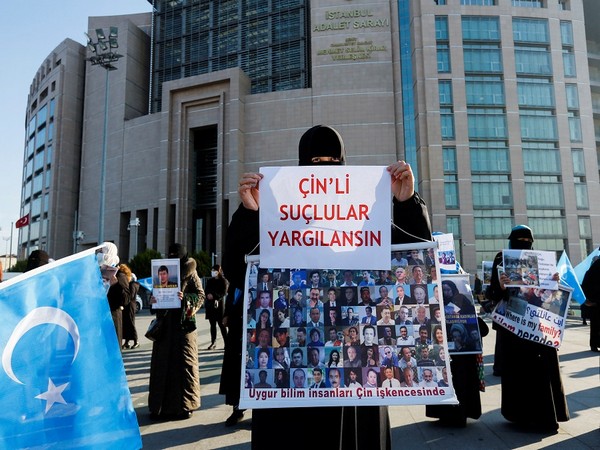 Ethnic Uyghur women take part in a protest against China in Turkey ( Photo Credit-Reuters)