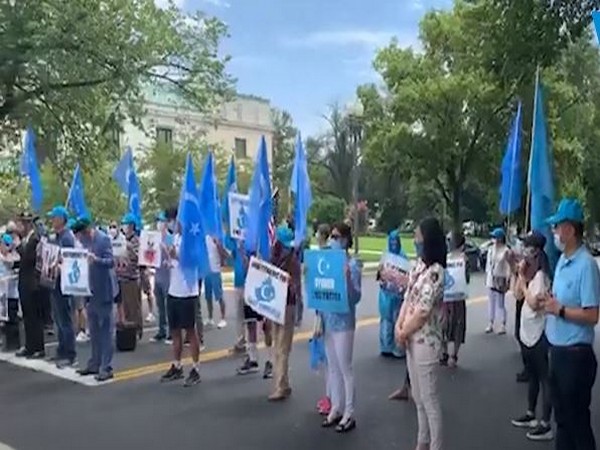Members of Uyghur community during a protest in the US (Video grab source: Voice of East Turkestan Youtube channel)