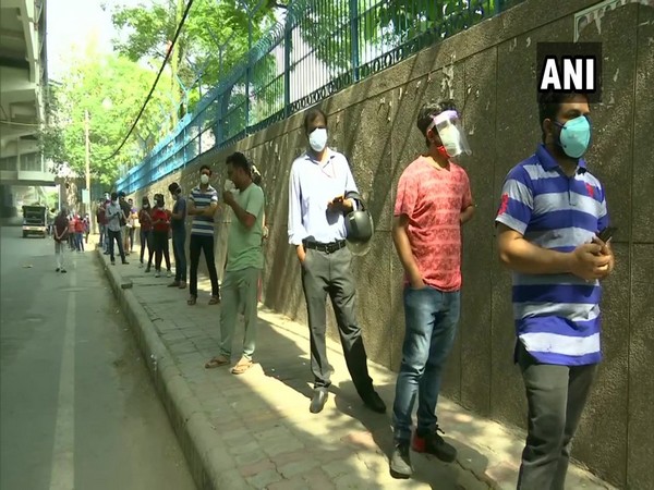 Long queue outside a vaccination centre in Ashok Nagar area in Delhi. (Photo/ ANI)