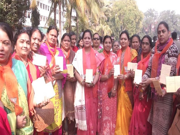 BJP workers with the postcards in support of CAA in Vadodara. Photo/ANI