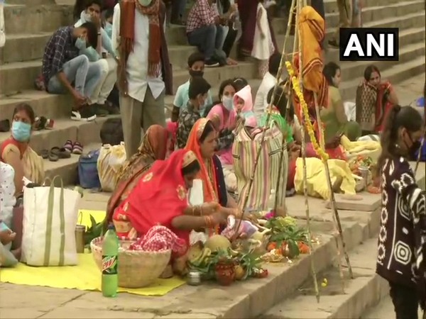 Devotees celebrate Chhath Puja at Assi Ghat (Photo ANI)