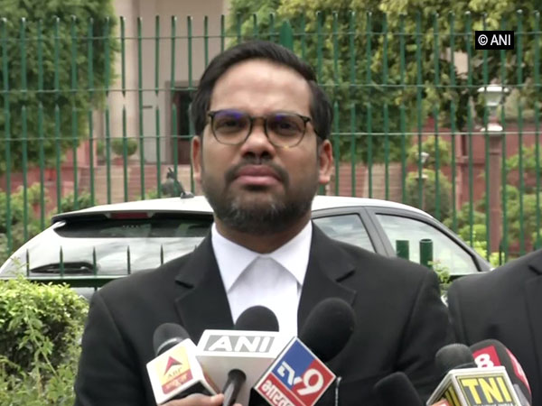 Varun Chopra, lawyer of Gujarat Congress leader Pareshbhai Dhanani, speaking to reporters in New Delhi on Tuesday.