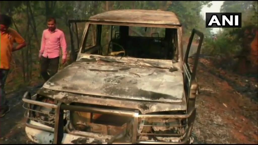 Visuals of the vehicle of poll party set on fire by Maoists.