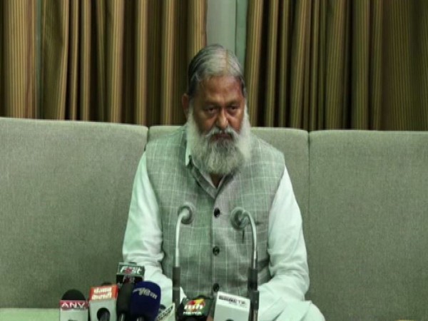 Haryana Health Minister Anil Vij talking to reporters on Thursday.