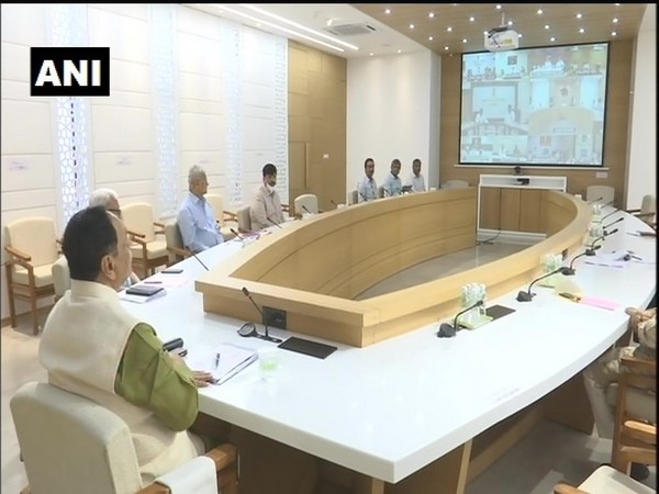 Gujarat Chief Minister holds a cabinet meeting through video conferencing. (photo/ANI)