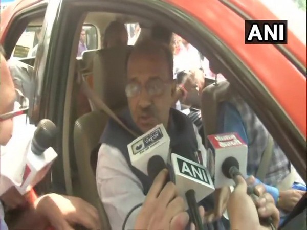 BJP leader Vijay Goel leaves from his house in an odd numbered car in protest against odd-even scheme