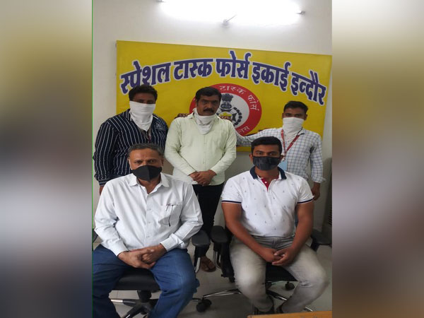 Indore STF arrested Vikas Bhandari (in yellow shirt) for allegedly being involved in a fraud of Rs 91 crore. [Photo/ANI]