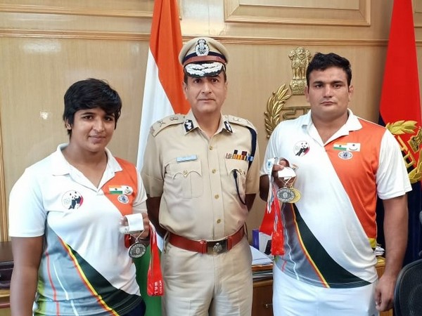 Manoj Yadava, Director-General of Haryana Police, with constables Baljit and Mohani.