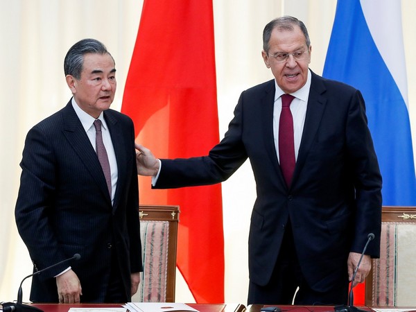 Russian Foreign Minister Sergey Lavrov and his Chinese counterpart Wang Yi. (Photo Credit - Reuters)