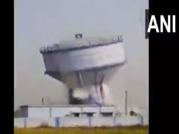 Falling of a huge overhead water tank in Bankura district's Sarenga area on Wednesday.