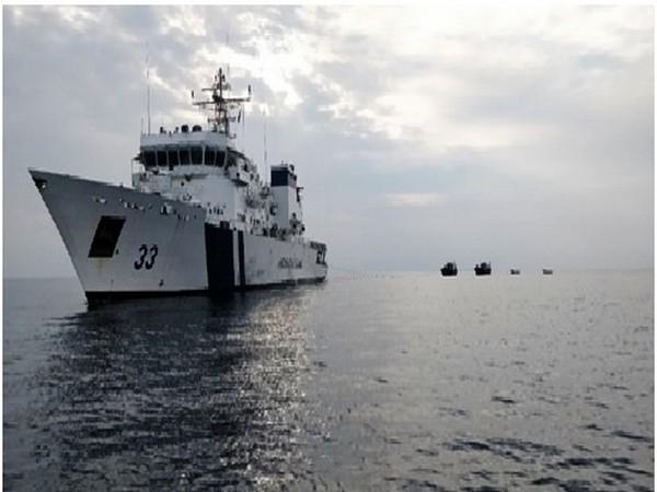 Indian Coast Guard offshore patrol vessel ICGS Vikram towing 2 crippled fishing boats