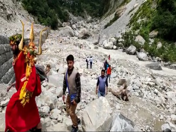 Pilgrims passing though the forest in Chamoli district in Uttarakhand. 