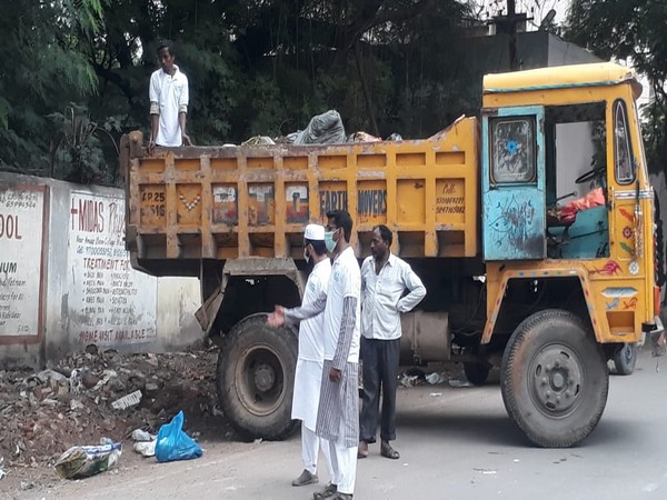 Members of the group carrying out cleanliness drive in Hyderabad on Monday. Photo/ANI
