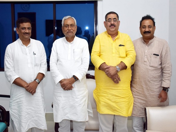 Bihar Chief Minister Nitish Kumar with party’s Delhi president Dayanand Rai on Monday. Photo/ANI