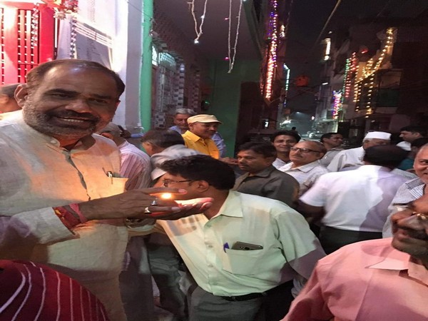 South Delhi BJP MP Ramesh Bidhuri celebrating Diwali with locals in an unregularised colony in his constituency on Saturday. Photo/ANI