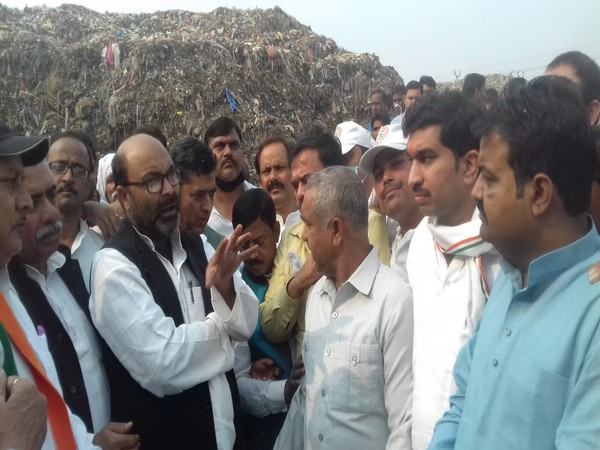 Uttar Pradesh Congress Committee President Ajay Kumar Lallu in the Kanpur Municipal Corporation dumping yard on Thursday. photo/ANI