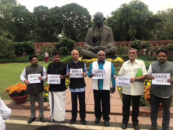 Communist Party of India (Marxist) MPs protesting near Mahatma Gandhi's statue in Parliament on Thursday (Photo/ANI)