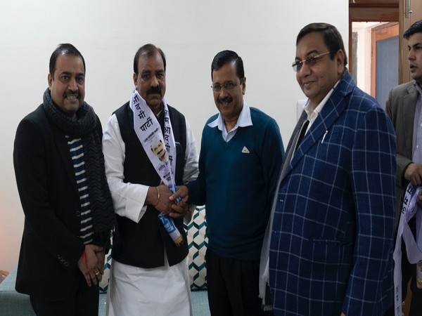 Former Delhi Youth Congress President Jagdish Yadav with Delhi Chief Minister Arvind Kejriwal and AAP MP Sushil Gupta on Saturday.