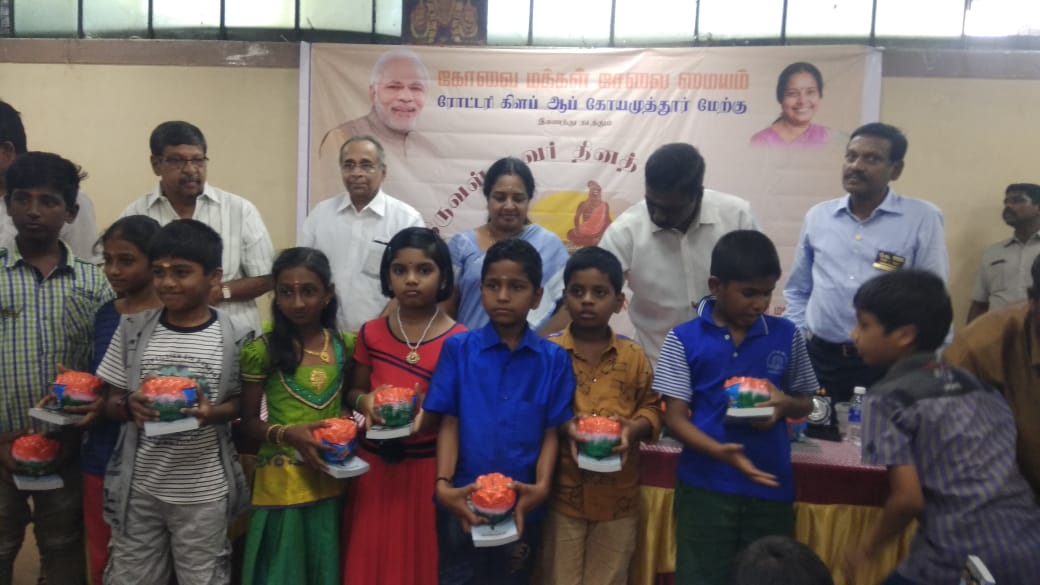 'Hundies' were distributed among students during the celebrations of Thiruvalluvar Day in Coimbatore on Thursday.