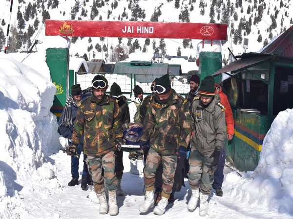 Indian Army evacuating a critically ill pregnant woman in Kashmir on Sunday.
