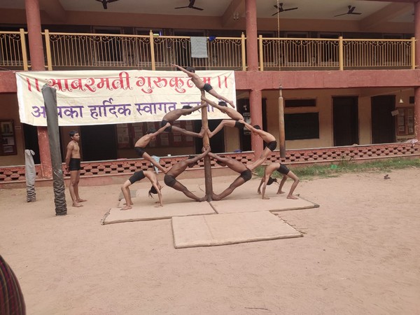  A group of 15 students of Sabarmati Gurukulam, in Ahmedabad, practice Mallakhamba ahead of the arrival of US President Donald Trump. Photo/ANI