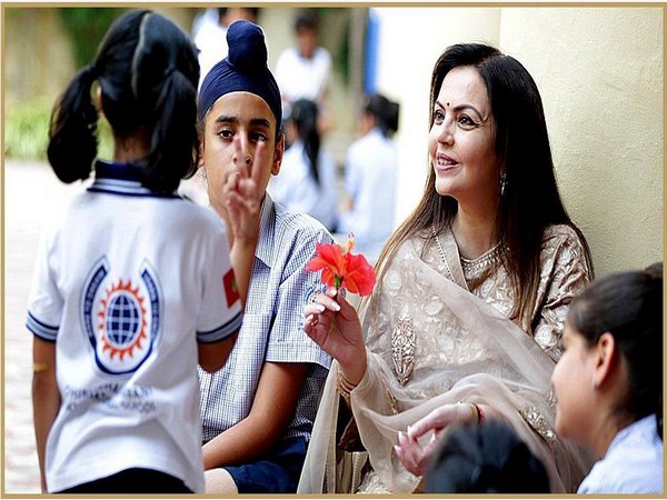 Founder of Dhirubhai Ambani International School Nita Ambani with school children. 
