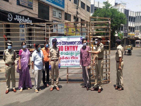 Police personnel at a COVID-19 containment zone in Khairtabad, Telangana on Thursday