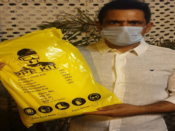 Businessman Robert Vadra with a PPE kit.    