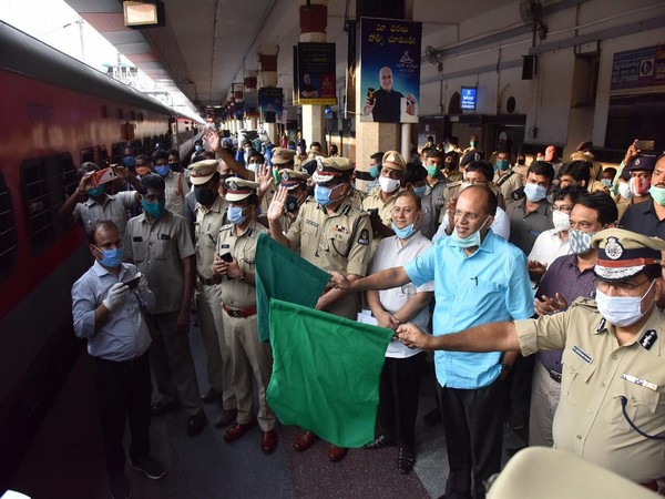 Chief Secretary flagging off a train at Nampally railway station. [Photo/ANI]