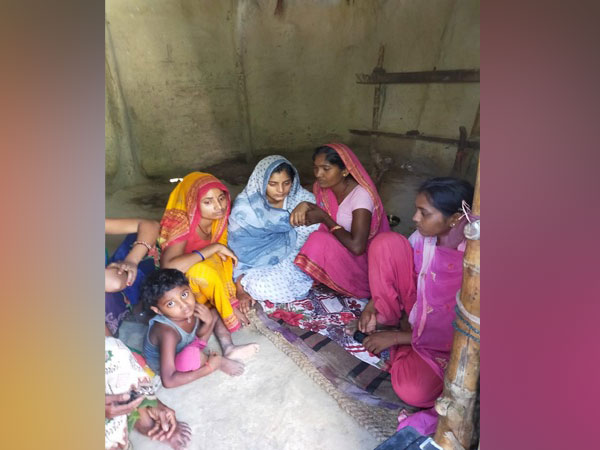 The lady in white saree grieving the loss of her husband. Photo/ANI
