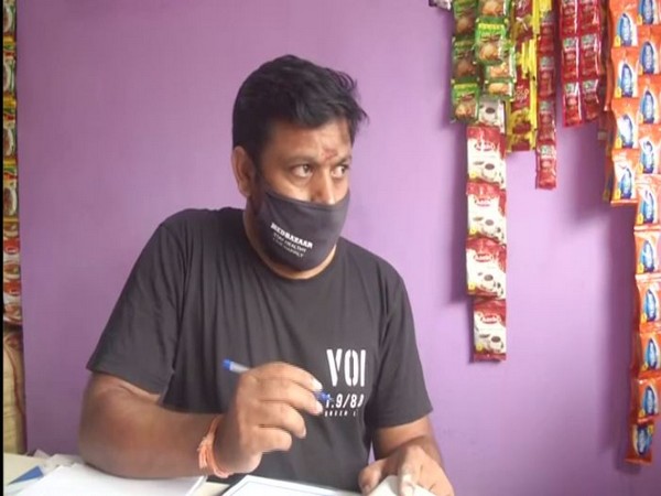 Filmmaker Anand at his grocery shop (Photo/ANI)