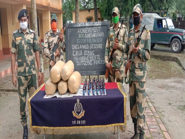 BSF jawans of the 141st Battalion pose with the confiscated items. (Photo/ANI)